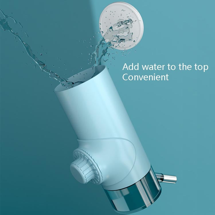 Hanging dog ball waterer with water flowing into the top opening