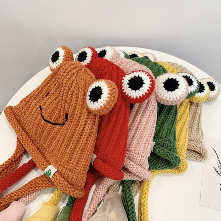 Knitted frog hats in assorted colors, each with smile face and large white-and-black eyes