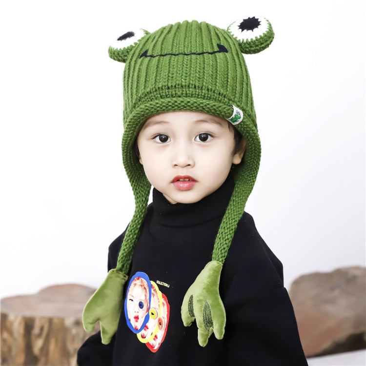 Green frog-themed knit beanie with cartoon eye details and plush ear flaps