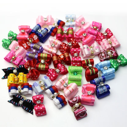 Assorted ribbon dog bow ties set with pearl accents in pink, red, blue, green, and more