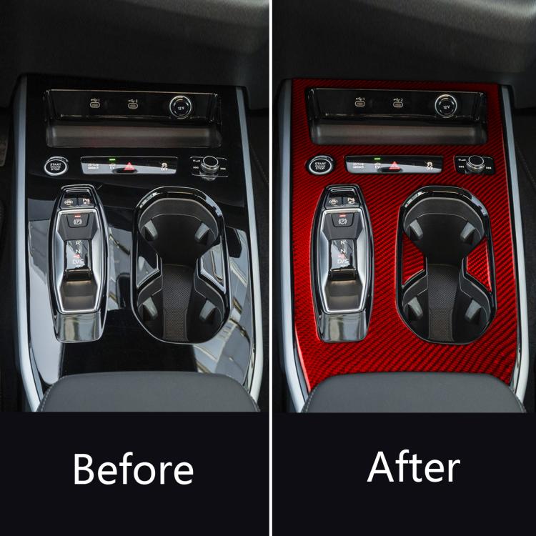 Center console control area with red carbon-fiber trim panel and silver shifter