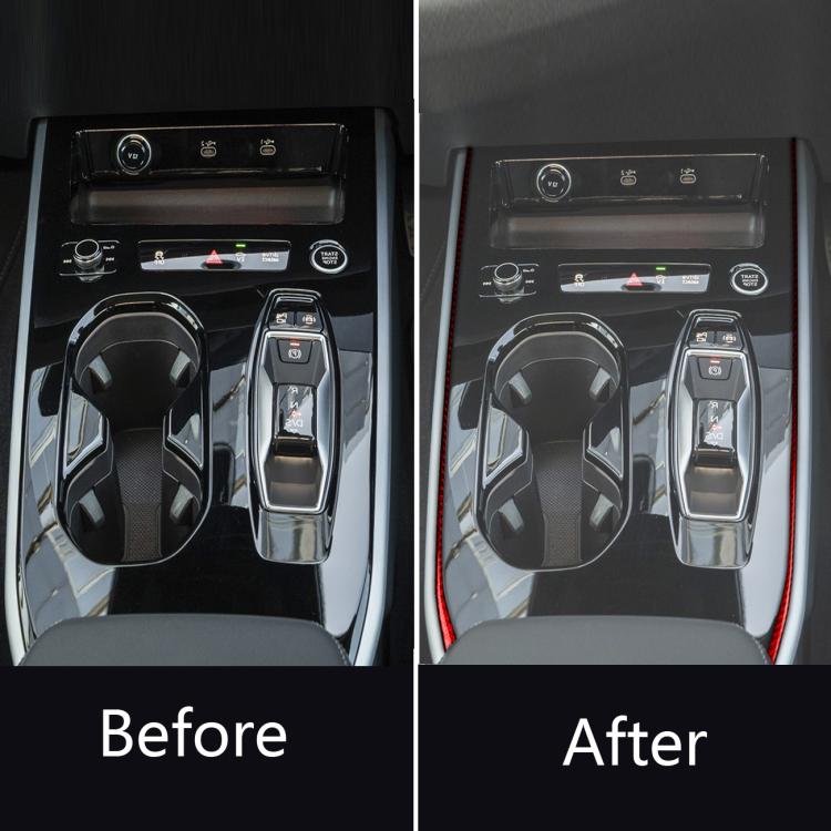 Car center console with added red gear shift side trim strips along the sides