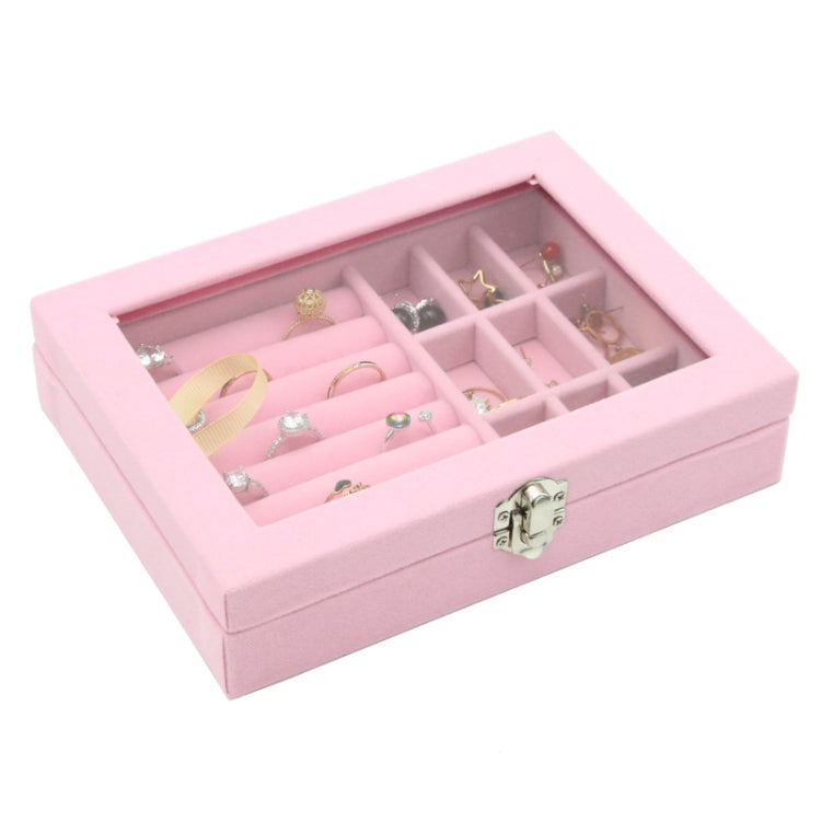 Pink flannel jewelry storage box with hinged lid and divided grid compartments, open view