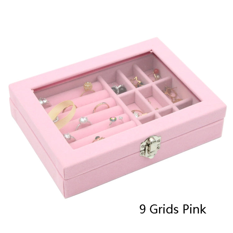 Pink flannel jewelry box with hinged lid and grid compartments for rings and earrings, open