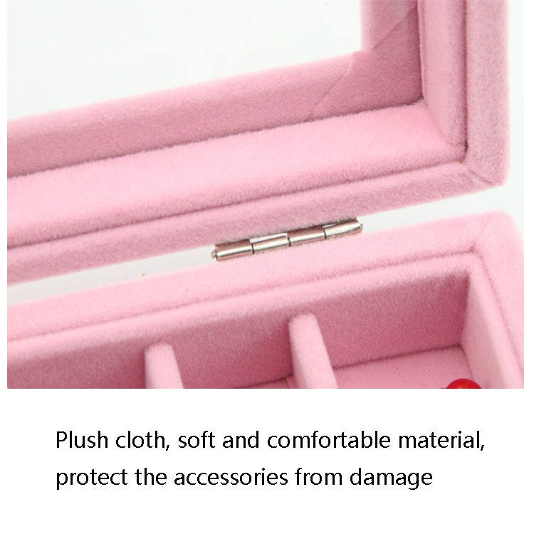 Close-up of plush pink flannel interior lining in a jewelry storage box