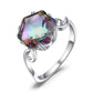 Silver-tone ring featuring a large multicolor iridescent cushion-cut gemstone centerpiece