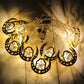 Eid LED string lights featuring crescent and lantern cutouts with warm white illumination.