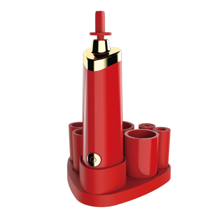 Red electric makeup brush scrubber with gold cap and upright cleaning head on base