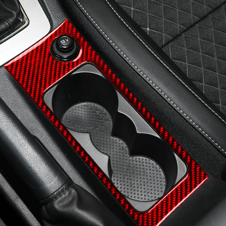 Red carbon-fiber cup holder trim insert with dual openings and knob recess