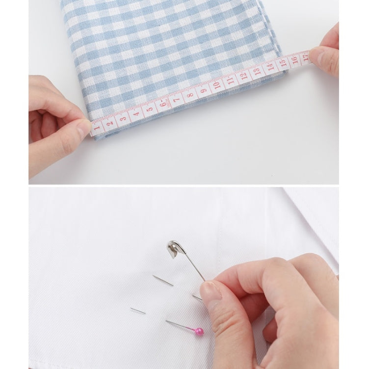 Measuring blue gingham fabric with a ruler and pinning white fabric with sewing pins