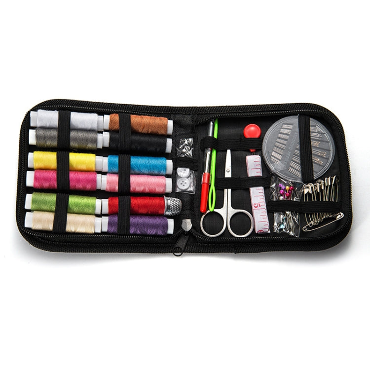 Fold-open black sewing kit case showing spools of thread, scissors, needle set, and pins