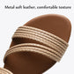 Close-up of apricot sandal straps with ribbed texture across the open toe