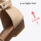 Close-up of apricot sandal wedge sole and ankle strap stitching