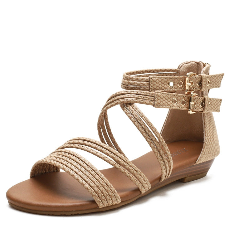 Apricot open-toe wedge sandals with braided-look straps and adjustable buckle strap