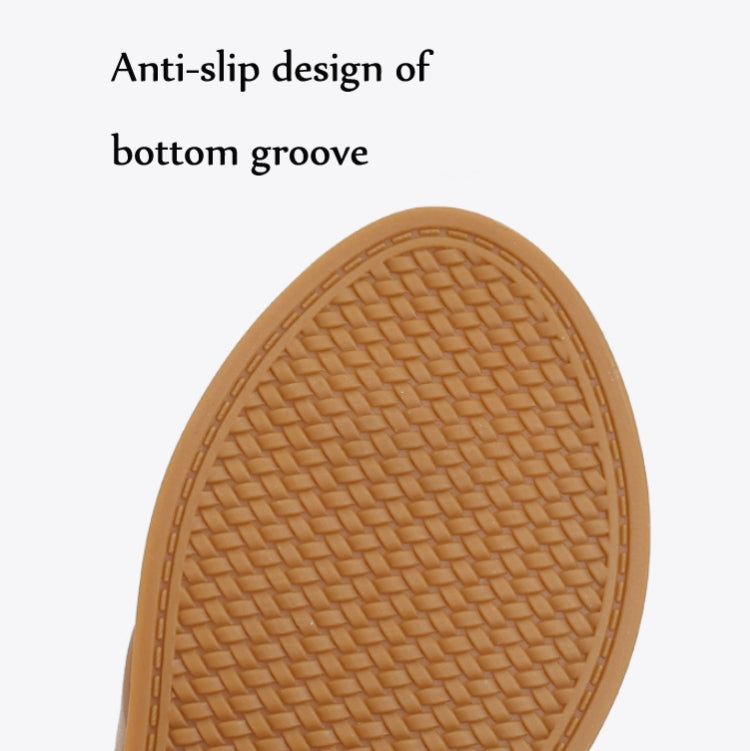 Tan sandal outsole with textured anti-slip tread pattern