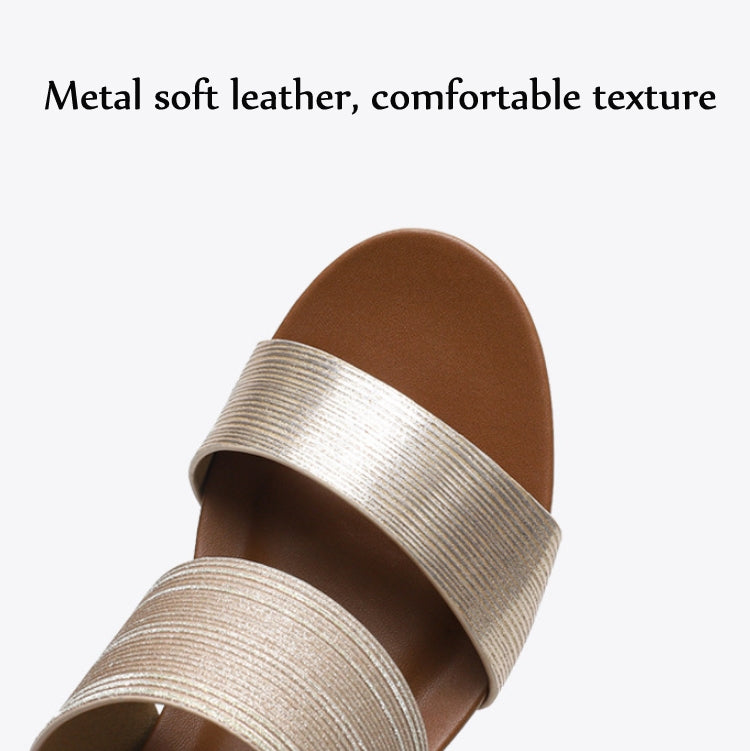 Champagne metallic two-strap slide sandals with open toe and textured fabric upper