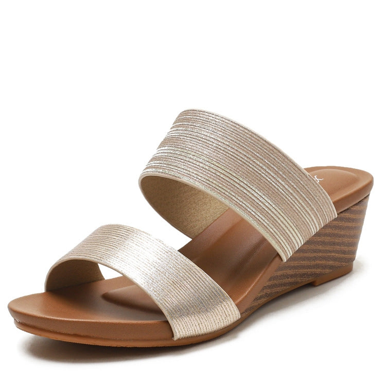 Champagne metallic two-strap platform wedge sandals with open toe and wood-look sole
