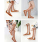 Pair of brown high-top Roman sandals with striped cutouts and lace-up ankle
