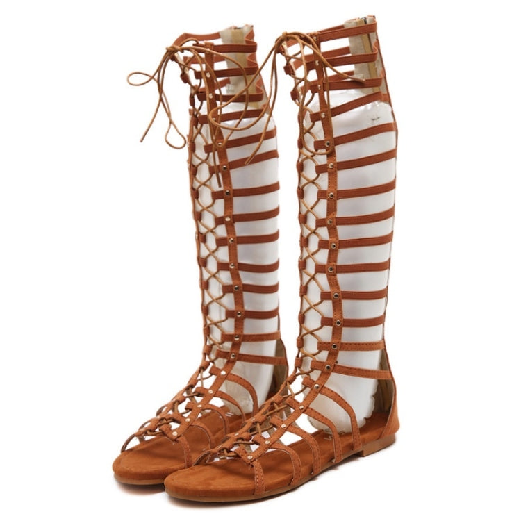 Women’s flat high-top Roman style sandals in brown with striped cutout straps