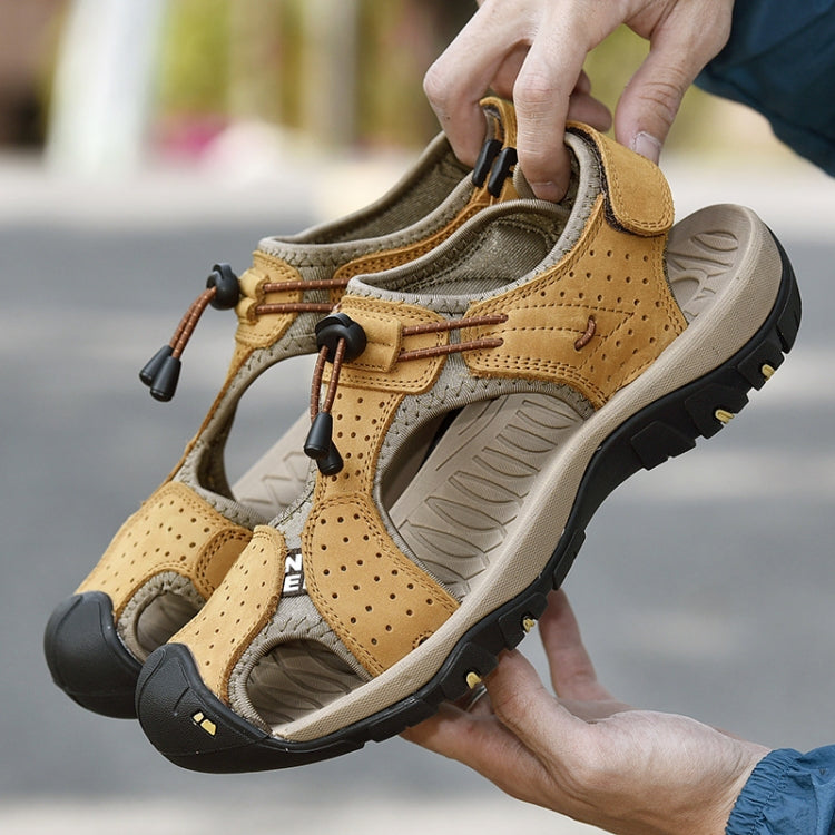 Men’s tan leather wading sandals with perforated upper, lace-up front, and grippy sole