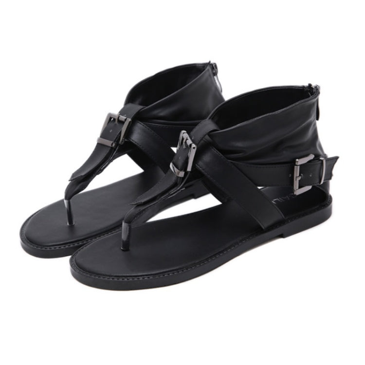 Black thong sandals with two silver buckle details and ankle strap, flat casual flip-flops