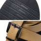 Rubber outsole tread of light brown sandals with buckle strap, black textured grip