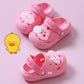 Children's pink clogs with cartoon patch on top and grippy molded sole