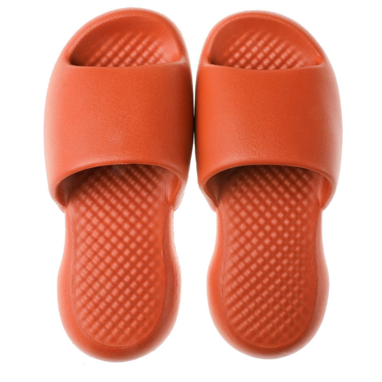 Orange plastic slide slippers, textured footbed, open toe, thick padded sole