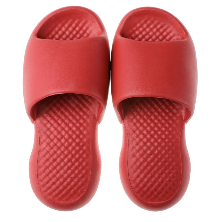 Red wine plastic slide slippers with textured footbed and wide open toe, pair view