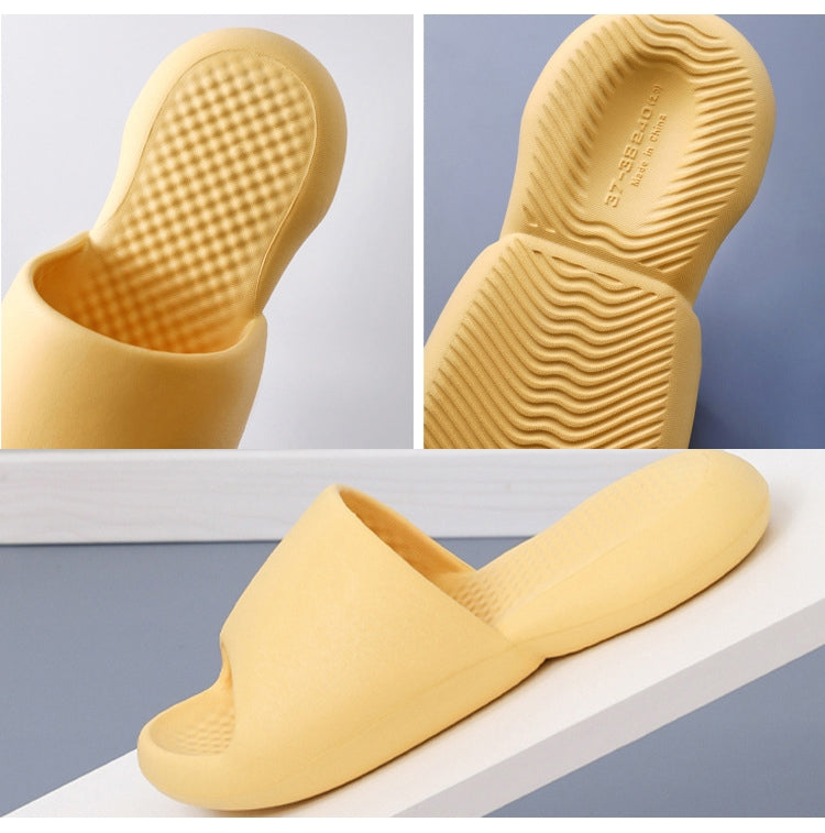 Yellow plastic slide sandals with textured tread, side and sole views