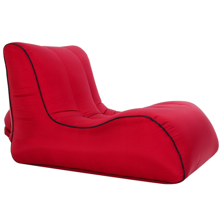 Red inflatable single lounge seat with black edging and supportive backrest.