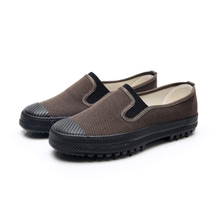 Men's slip-on work shoes with textured fabric upper and black rubber sole