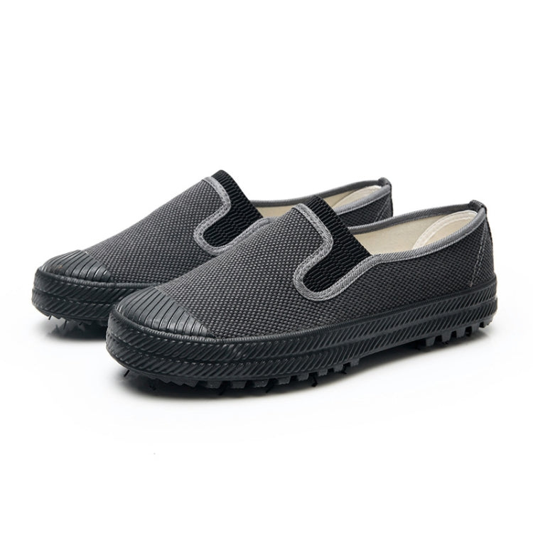 Men's slip-on work shoes with padded heel collar and rugged tread rubber outsole