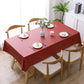 Red waterproof disposable tablecloth with solid finish for table protection