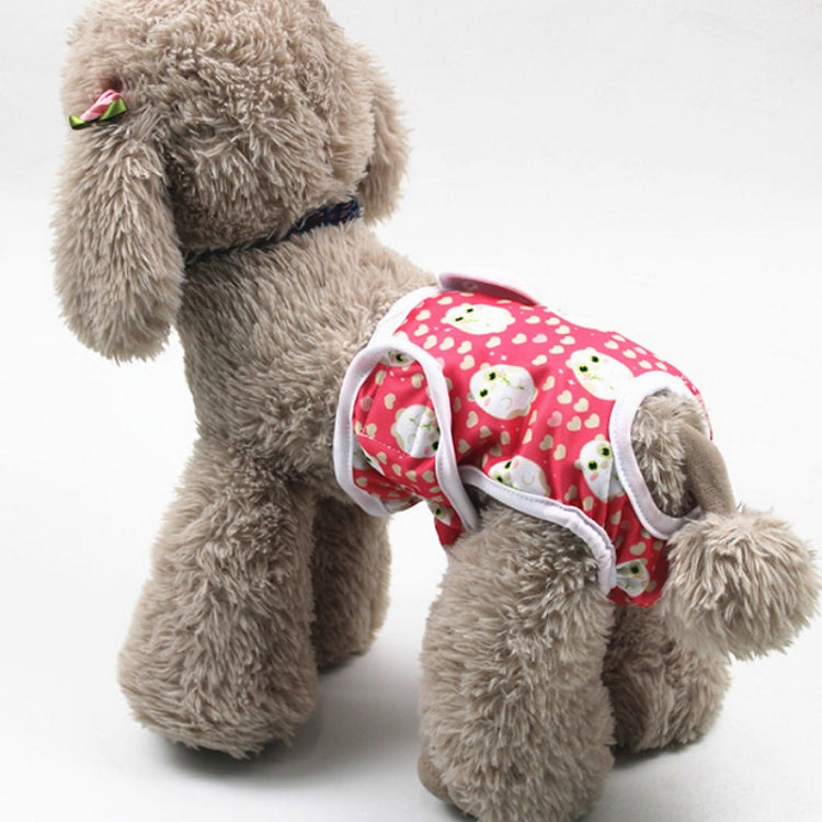 Dog anti-harassment pants with red strawberry print, worn by a plush brown dog.