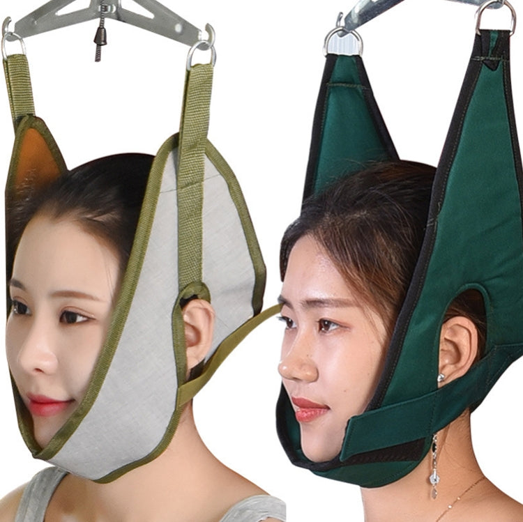 Cervical traction sling with light green straps and gray hood, side view on person