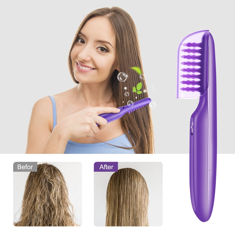 Woman holding a purple electric rotating hair comb near her hair