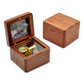 Dark wood wooden music box with open photo frame holding black-and-white photo card