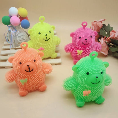 Set of cartoon bear hair stress balls with hanging loops in orange, pink, green, yellow