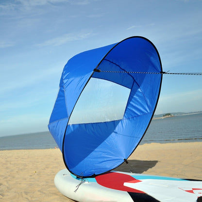 Downwind kayak sail, blue inflatable sail with black rim and clear window panel