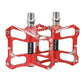 Red aluminum alloy bike pedal with wide platform and threaded axle