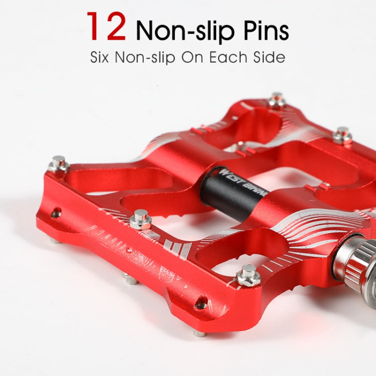 Red aluminum alloy bike pedal with non-slip pins and axle