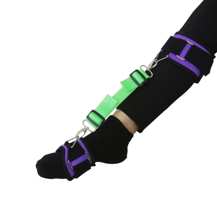 Foot drop rehabilitation brace with black cuff, purple strap, and green adjustable connector