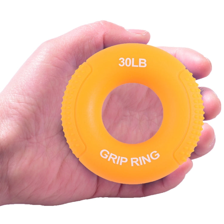 Yellow silicone finger exercise grip ring, 30LB resistance, grippy ridges and center hole