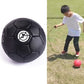 Black children training football shown close-up