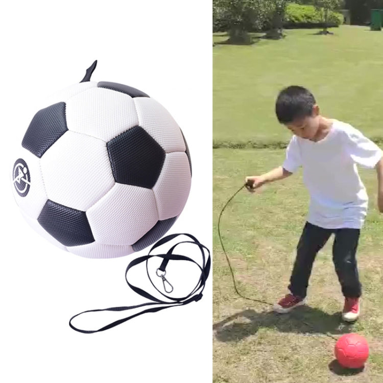 White and black kids training football with attached black rope