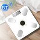 White smart Bluetooth weight scale on wood floor with bright digital screen