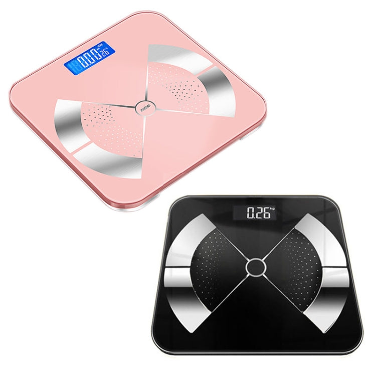 Pair of digital body fat scales: pink and black, each with LCD readout and sensor grid