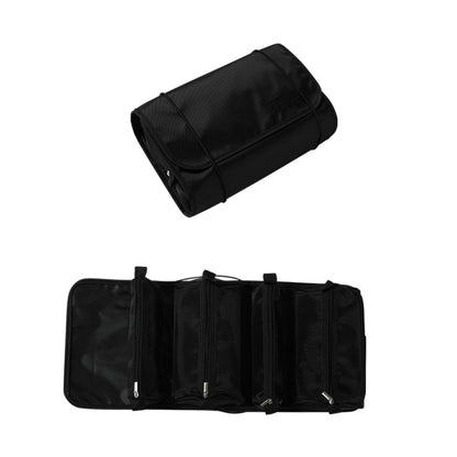 Cosmetics storage bag in black with multiple zip compartments and adjustable top strap