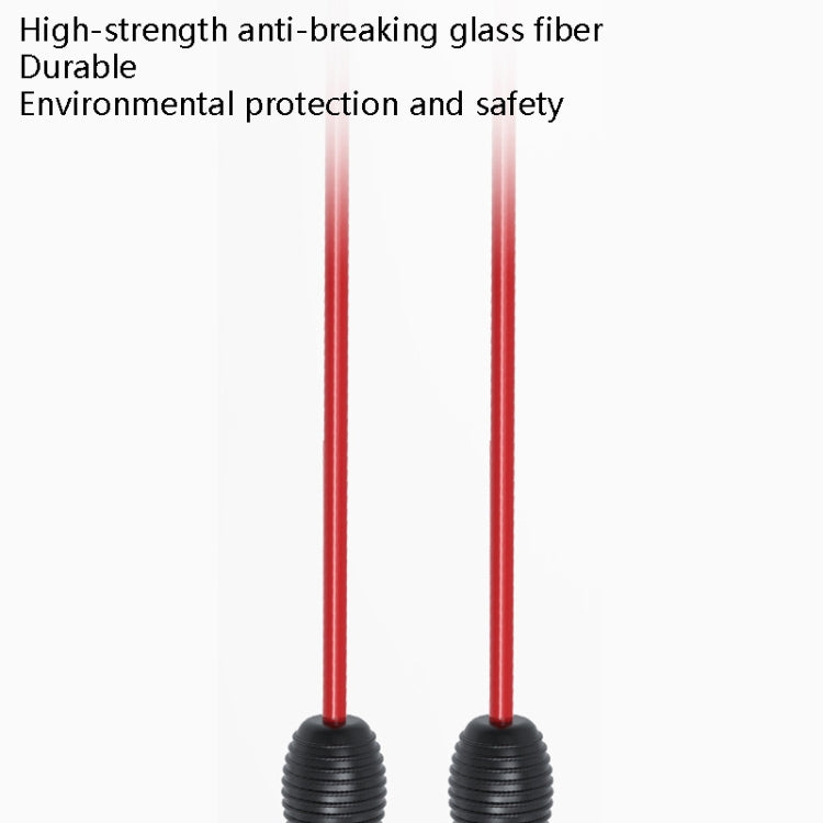Red fiberglass training tremor stick with black end caps at both ends